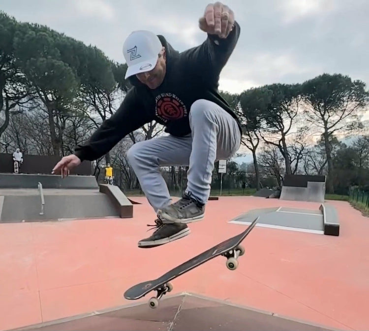 Enrico Regazzi performs a trick on his skateboard in the skate park